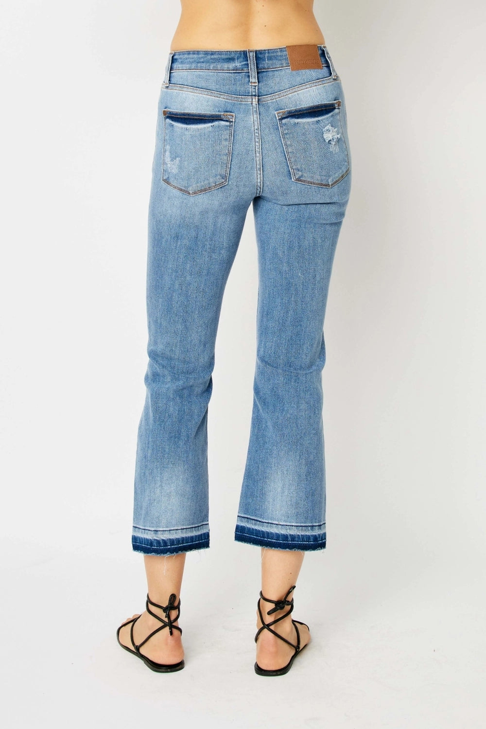 Back View Judy Blue Mid-Rise Release Hem Cropped Bootcut